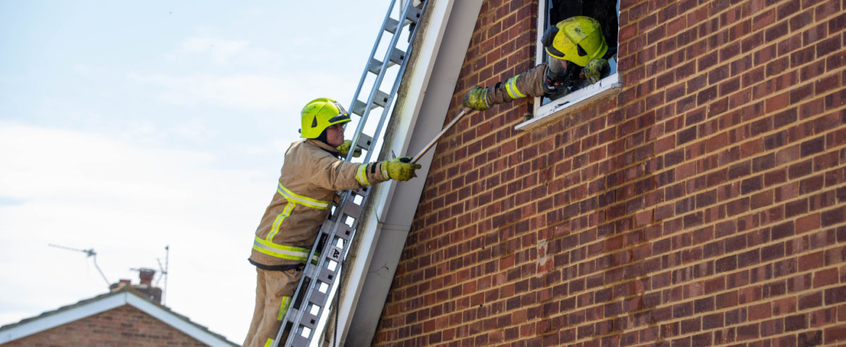 Kent Fire & Rescue fire man on ladder